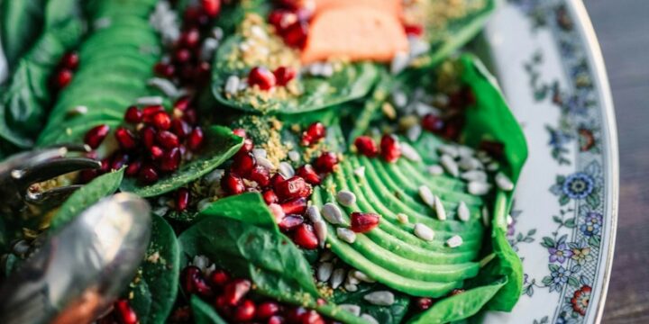 oval ceramic plate with and green and orange food