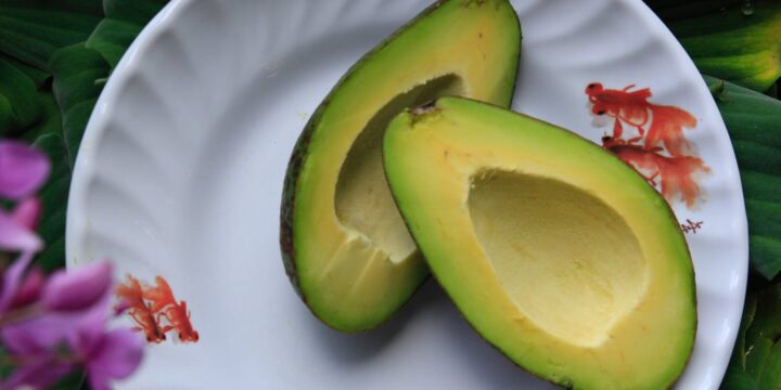 Sliced Avocado Fruits on Round White Ceramic Plate