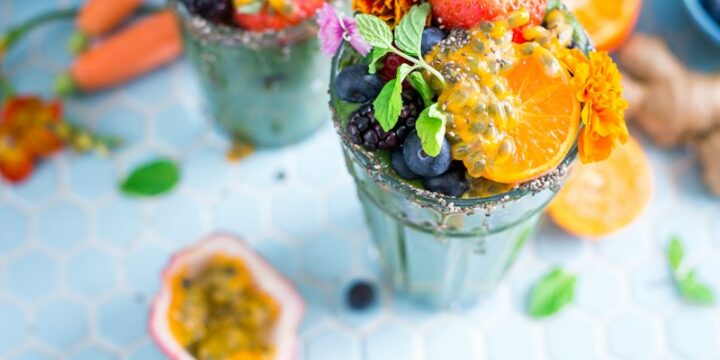 tilt shift lens photography of fruits in drinking glass